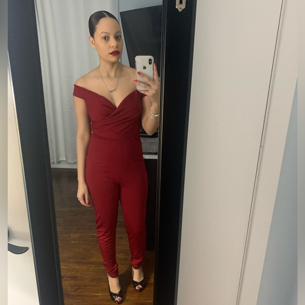Red jumpsuit.